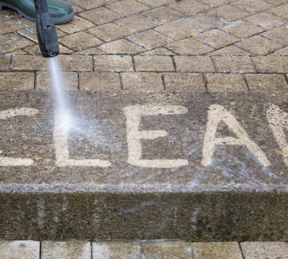 Outdoor floor cleaning with high pressure water jet